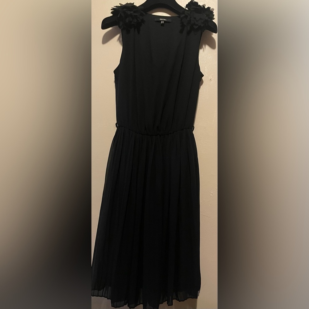 Classic Black Women's Sleeveless Dress. Not belt. Size 34